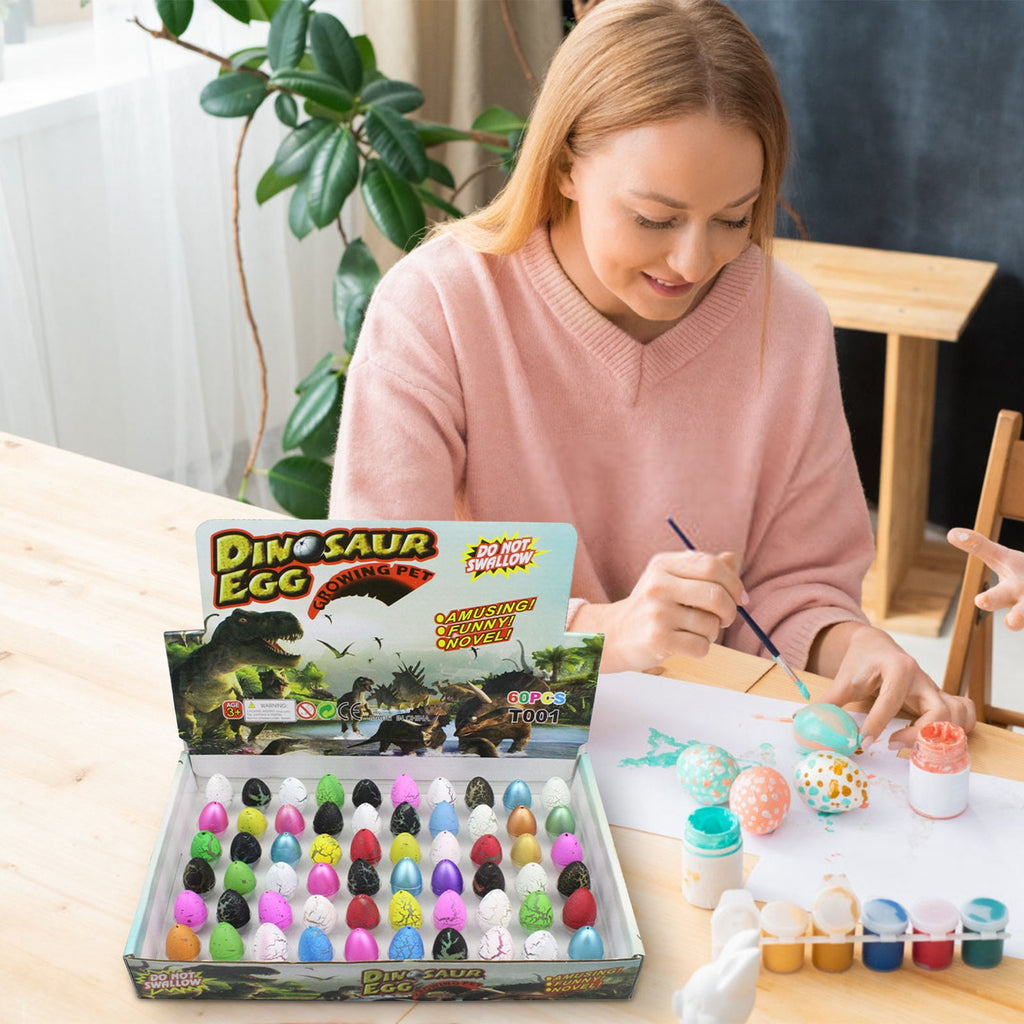 MXTPOV 60pcs Small Hatching Dinosaur Eggs for Party Favors, Easter Basket Stuffers Classroom Carnival Prizes Bulk Pinata Fillers Novelty Grow in Water Dino Eggs with Toys