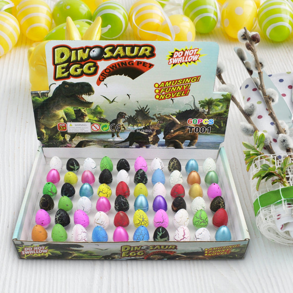 MXTPOV 60pcs Small Hatching Dinosaur Eggs for Party Favors, Easter Basket Stuffers Classroom Carnival Prizes Bulk Pinata Fillers Novelty Grow in Water Dino Eggs with Toys